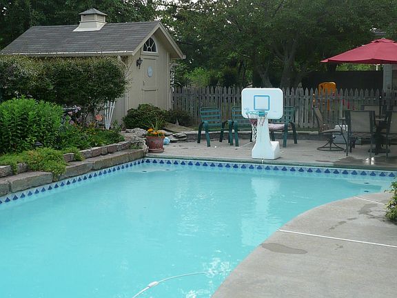 West pool view with shed