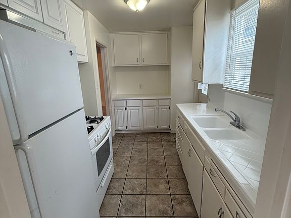 Kitchen with coffee bar or baking center