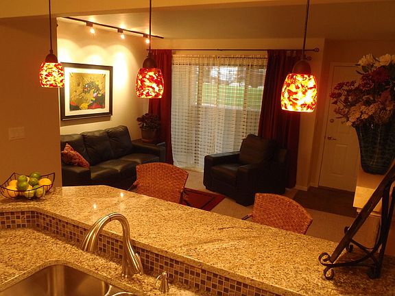 Livingroom, new carpet, fireplace mantle and stone surround, covered patio 