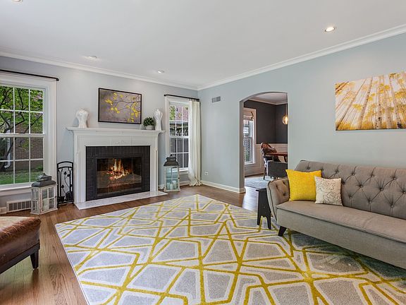 Elegant Living Room with wood burning fireplace.