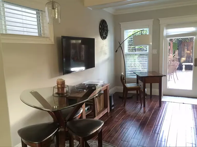 Small dining and desk. Turntable and vinyl records for your listening enjoyment.