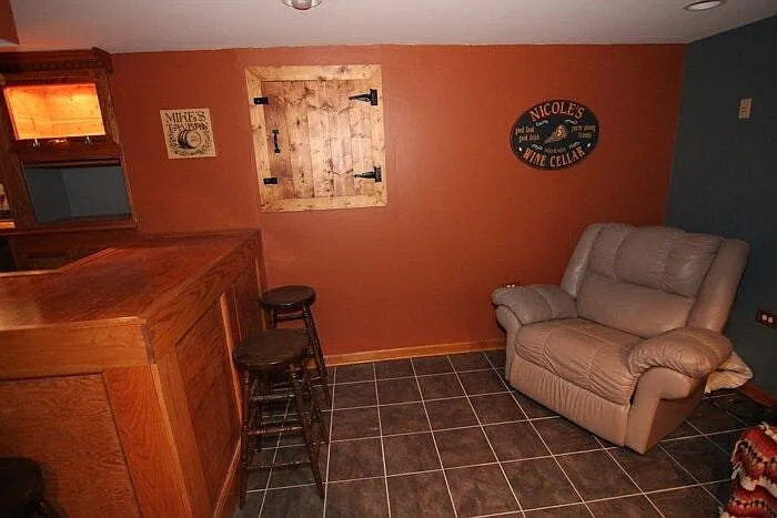 Finished basement with large bar