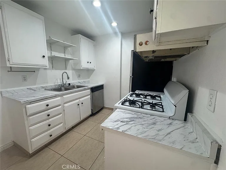 6600 Warner Ave #115 — Photo 7