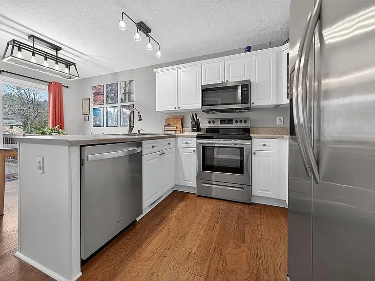 Kitchen and dining area (All appliances are included but furniture is for illustrative purposes only).