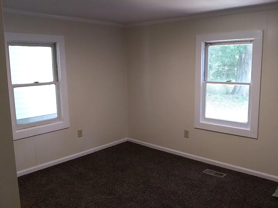 12x 12 bedroom.closet and new carpet. New windows on order