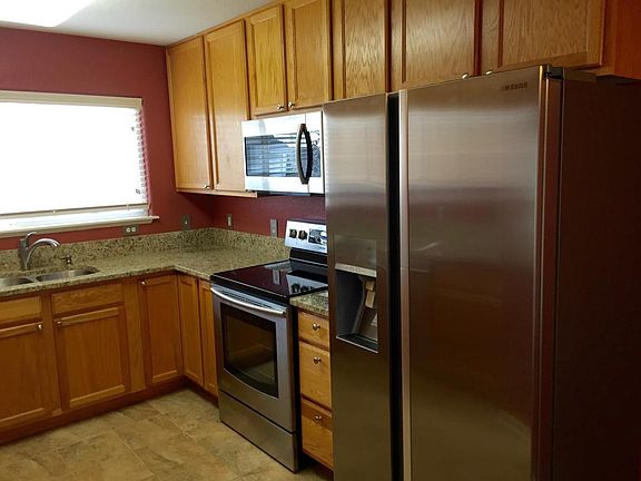 Beautiful kitchen with granite countertops - will have fresh neutral painted walls by September 1 2022