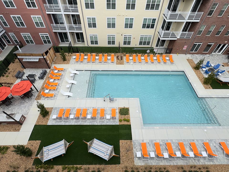 Unwind by the pool, surrounded by serene tranquility