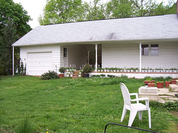 Wrap around patio with Semi-attached garage