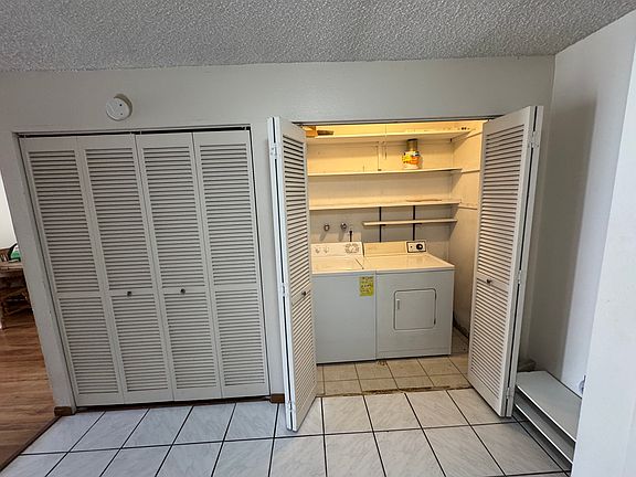 Entry way - washer / dryer and mechanical closet