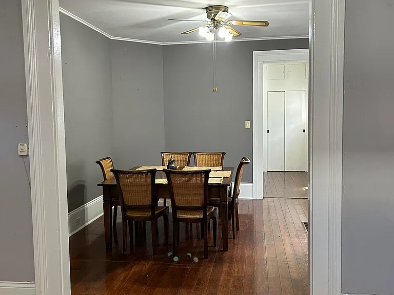 Open casing leading from living room to dining room