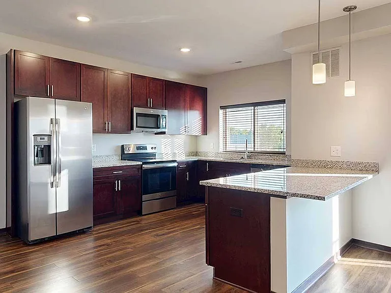 Whip up your favorites in a modern kitchen with ample counter space and stainless steel appliances.