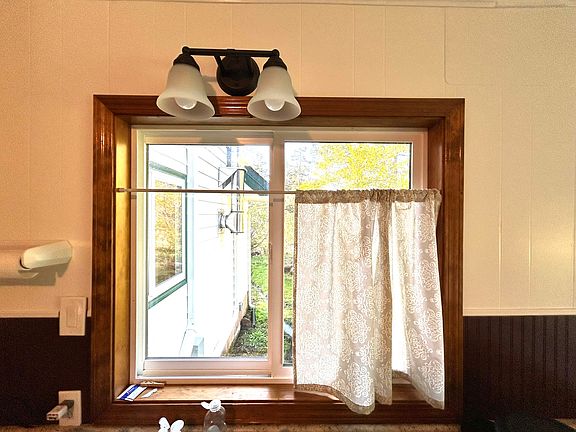Kitchen window above sink.