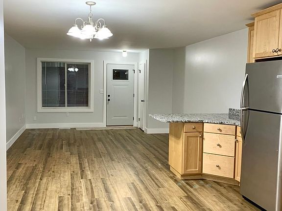 Open concept floor plan with luxury vinyl plank flooring throughout