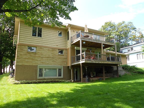 Back yard and double decks overlooking lake