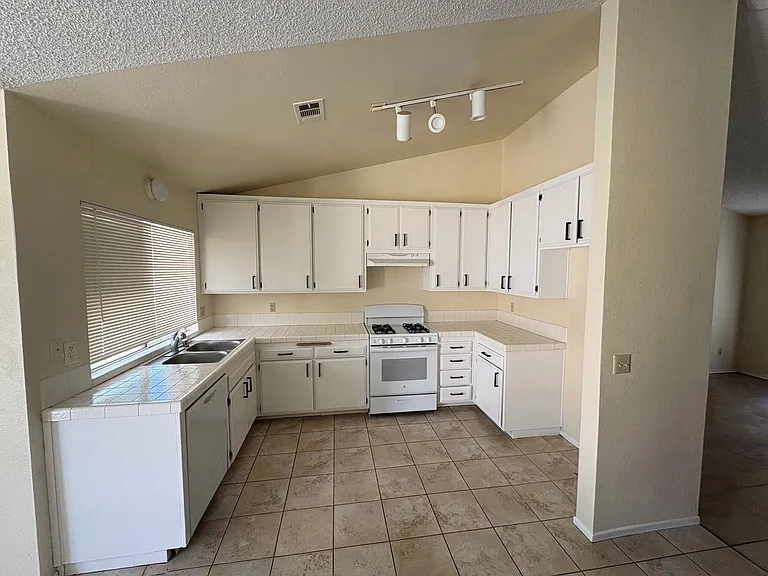Kitchen (Cabinets newly painted white)