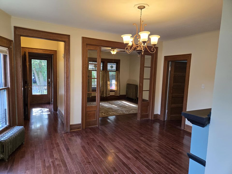 Dining room with view of front hall and living room