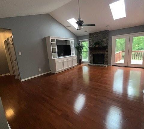 Great Room w/Walk out to top deck & fireplace