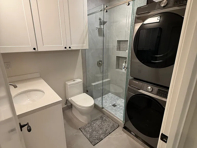 Bathroom has recently been renovated to add full laundry.
