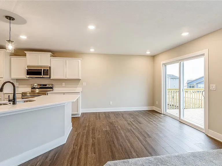 Dinning area with view to deck and backyard
