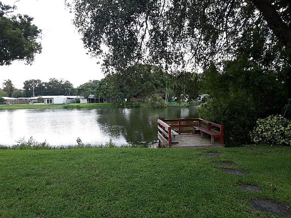 Home sets on Lake Thomas, a small neighborhood private water highlight with 20 homes surround. The backyard is fenced with relaxing deck.