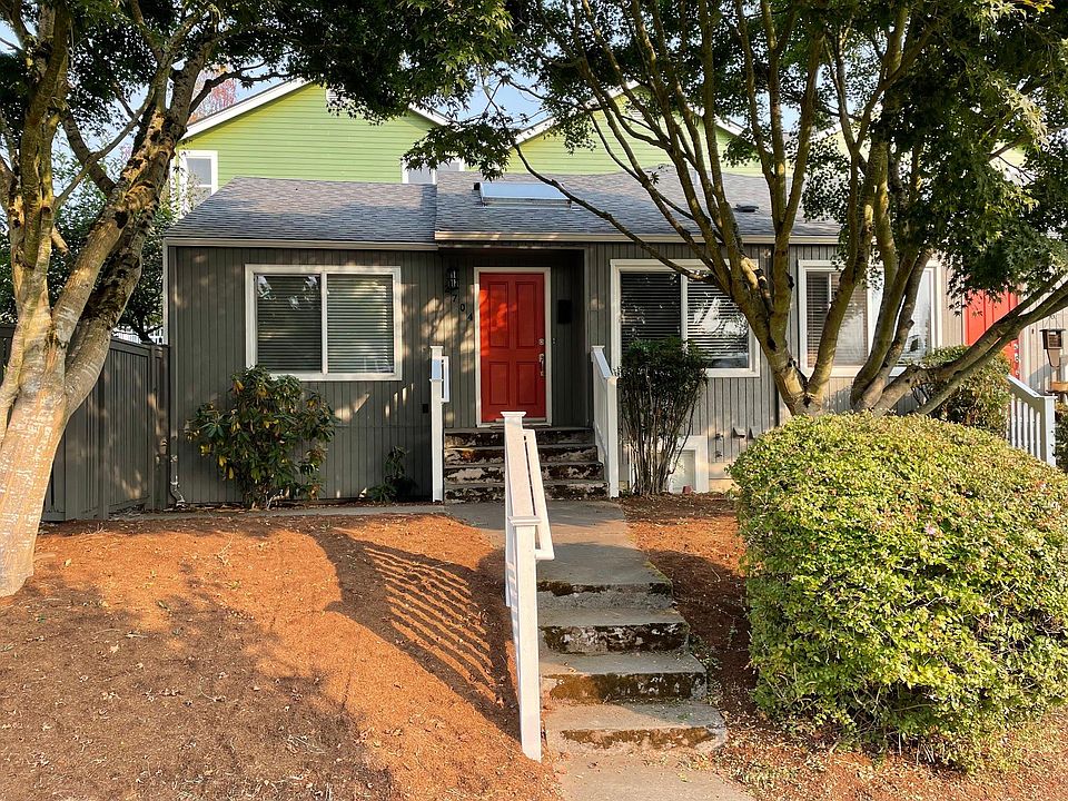 Front yard with beautiful Japanese maples providing shade