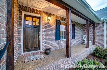 Front Porch
						:
						Mahogany front door and cedar posts