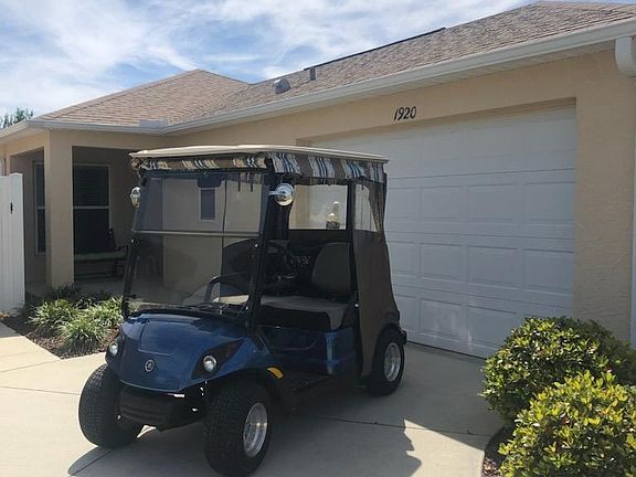 Two Seater Gas golf cart with rear golf bag holders - Included with house rental