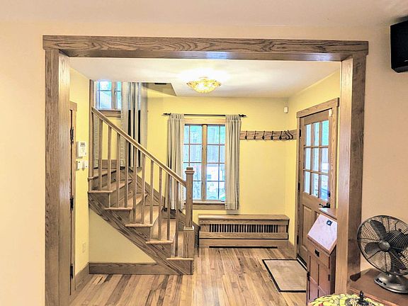 View of entryway with stairs leading to the second floor