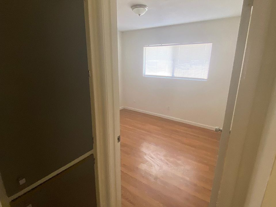 second bedroom and hall cabinets