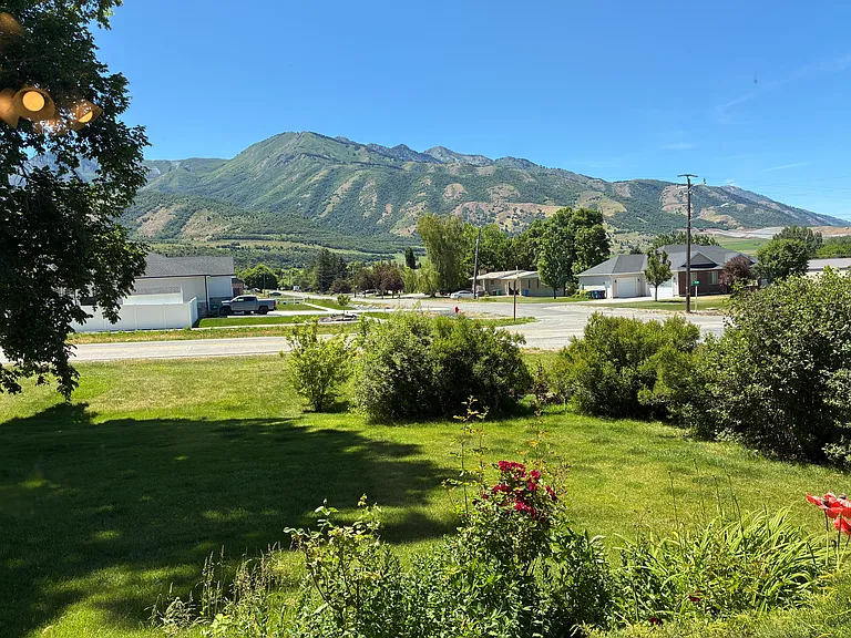 View from living room west window of the Wellsville Mountains.
