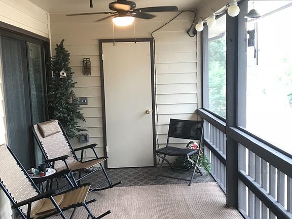 Fans and lighting on screened in deck