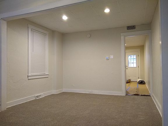 Dining room, open to living room and hallway to kitchen