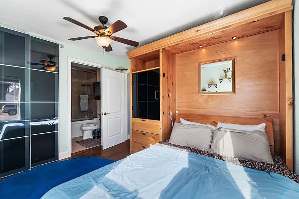 Primary Bedroom: It comes empty! The murphy bed isn't there.