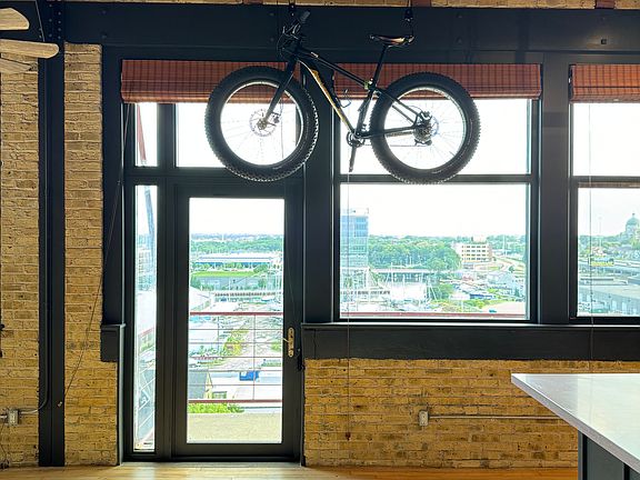 Ceiling mounted bike hoist offers secure storage out of the way!