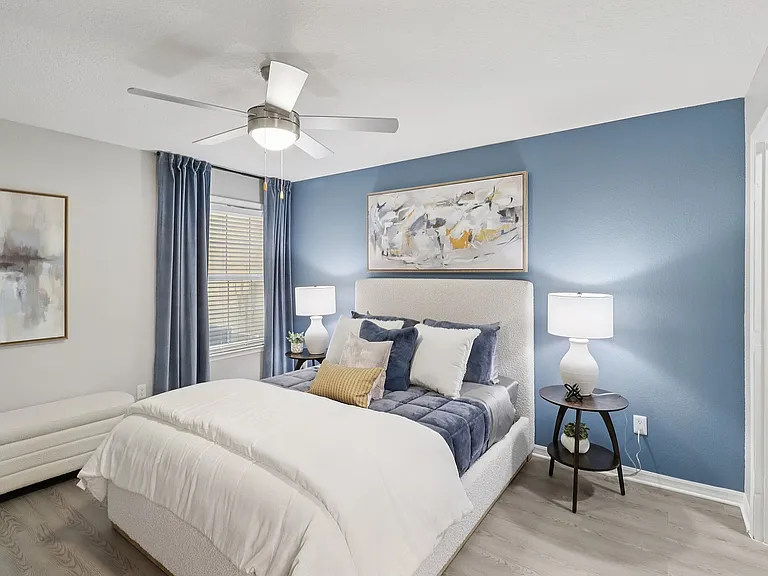 Spacious bedroom with modern design and ample storage