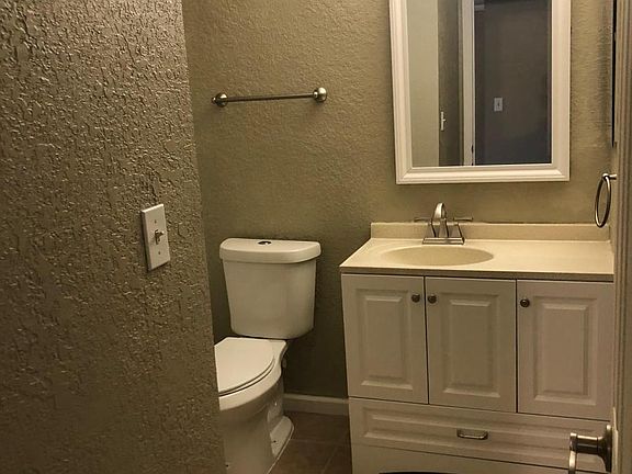 2nd image of 10195 Sailwinds Blvd N APT 105