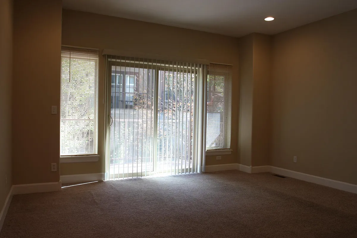 Living room looking towards deck - 20310 W US Highway 160