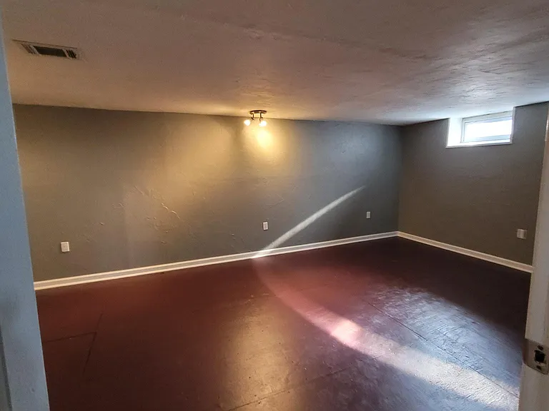 Basement. Movie/game/ play room. Not a bedroom.