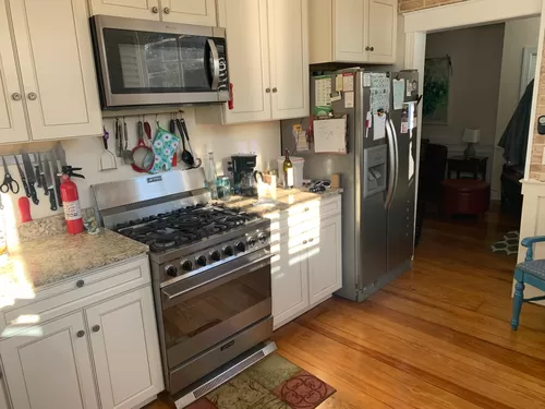 SMEG Gas range and large refrigerator, plus all flat ware and pots/pans. - 245 Lincoln St