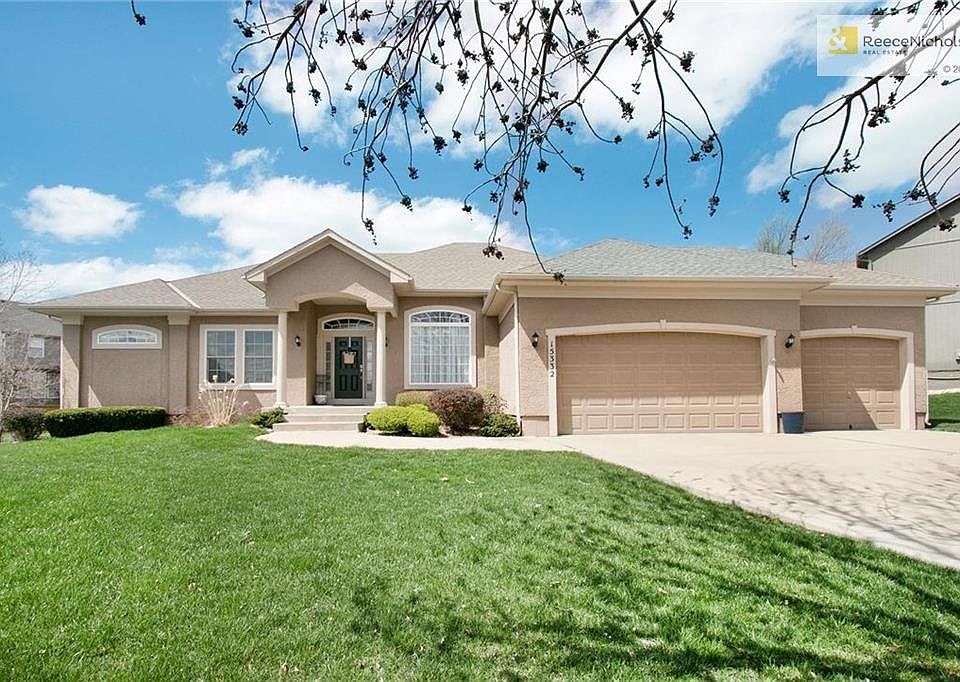 Don't miss this custom designed ranch home on a huge corner lot with a three car garage.