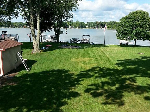 View of yard &lake from deck