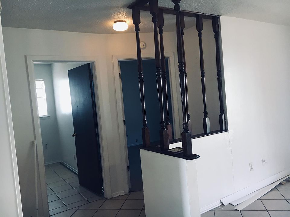 View from great room through hallway to front door.