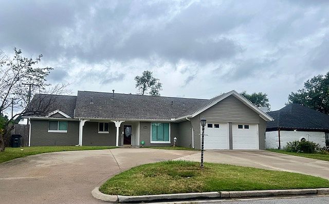 Front of House with circle driveway