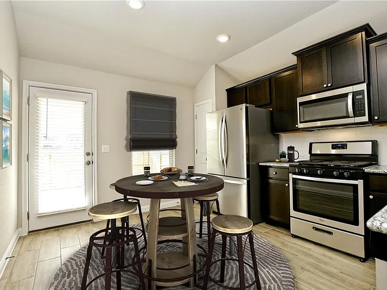 8205 Cottage Rose Dr — Photo 39