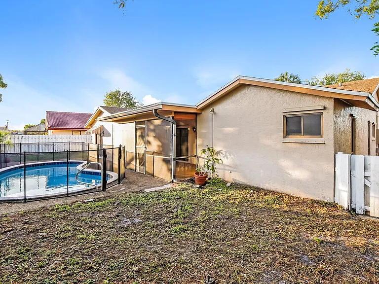 7686 NW 21st Ct — Photo 16
