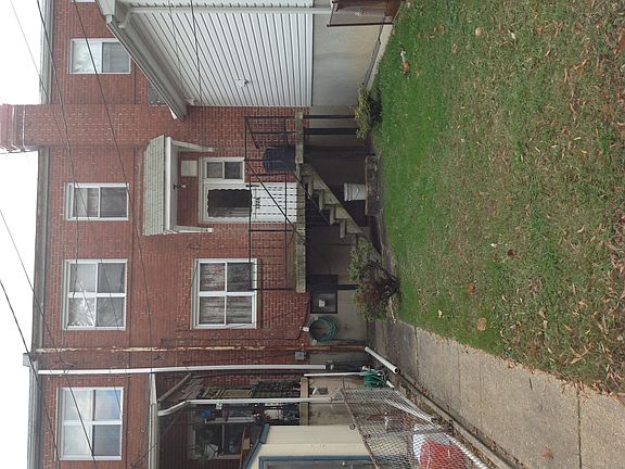 Backyard has parking pad