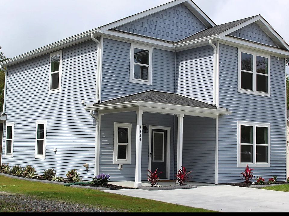 Front of home with large driveway -space for 3 or 4 cars