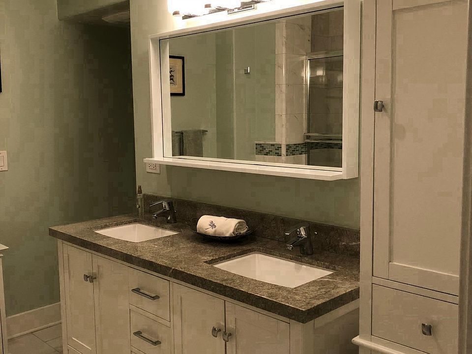 extra large bathroom with double granite vanity, soaking tub