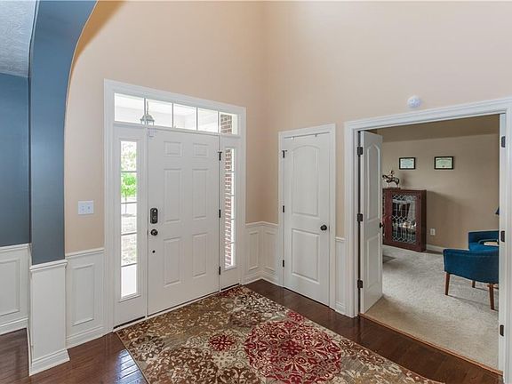 Two story entry with hardwoods