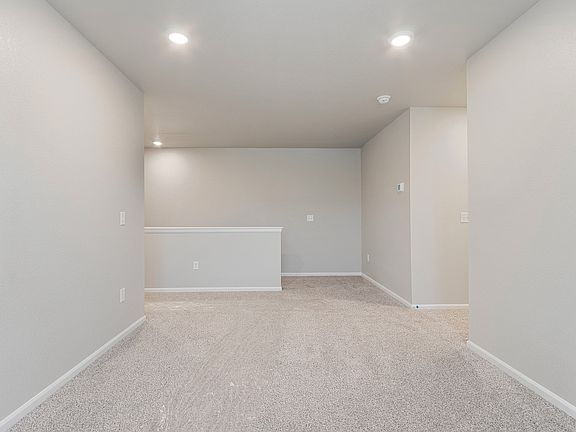 This home includes a loft perfect for some extra space for a home office or a space for the kids.